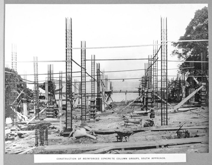 Reinforced concrete column construction, showing rebar cage and formwork. Queensland State Archives, 1936. Public domain, via Wikimedia Commons.