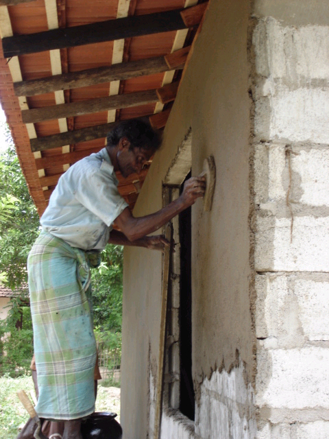 Brick masonry work during post-tsunami house construction in Matara District, Sri Lanka, 2005. Sarvodaya Shramadana Movement, via Wikimedia Commons. CC BY 2.0.