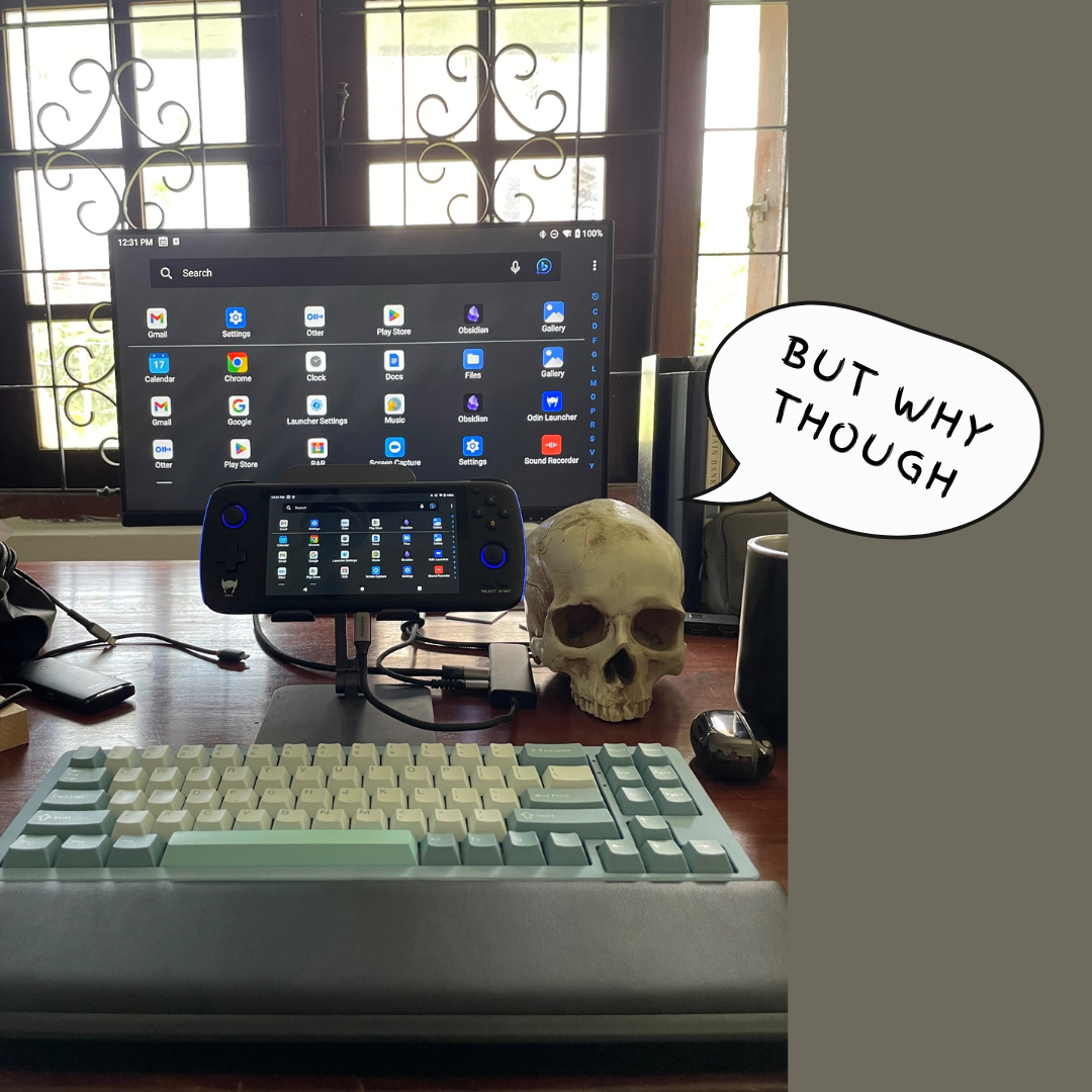 My AYN Odin, hooked up to a keyboard and a monitor.