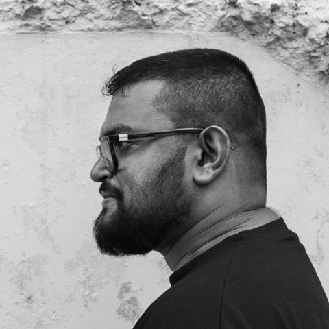 Portrait of Yudhanjaya Wijeratne in profile